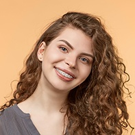 Teen girl with tooth-colored braces