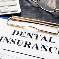 dental insurance form on table