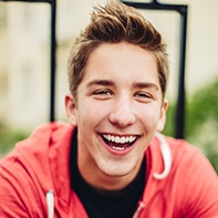 Teen boy with perfectly aligned teeth