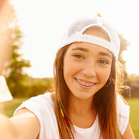 Teen girl with braces smiling