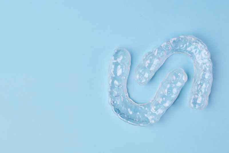 a set of clear aligners designed for a patient looking to straighten their smile