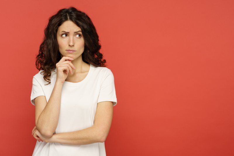 Woman has questioning expression